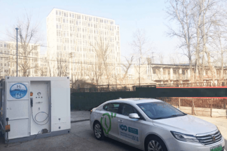 Zotye Z500EV electric car near hydrogen fuel station